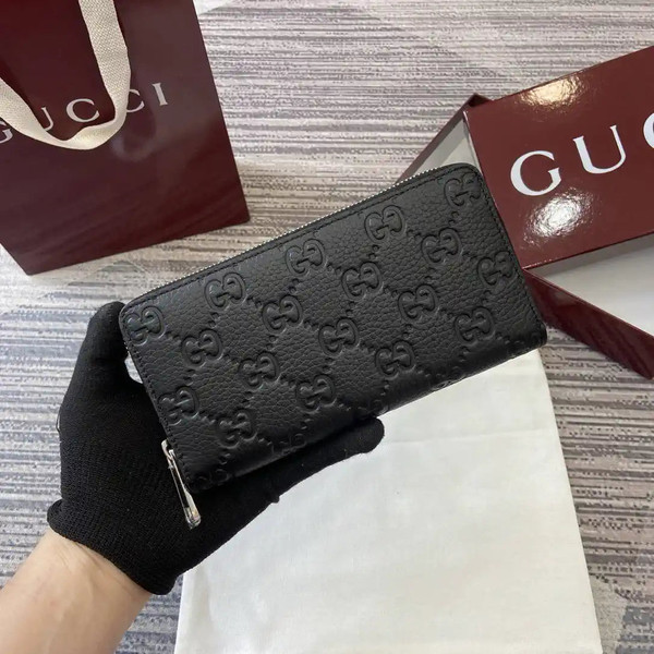 Gucci 835003 Gucci Imprint zip around wallet Black