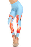 45 degree view of Creamy Soft Flamingo Extra Plus Size Leggings - 3X-5X - USA Fashion™ with a colorful flamingo design on a sky blue background.