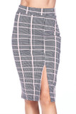 Front side of Baby Pink Glen Plaid Plus Size Midi Pencil Skirt with Front Slit showing off the split hem over the left leg Front side of Baby Pink Glen Plaid Plus Size Midi Pencil Skirt with Front Slit showing off the split hem over the left leg