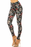 45 degree view of Creamy Soft Sugar Skull Floral Kids Leggings - USA Fashion™ with a male and female sugar skull design.