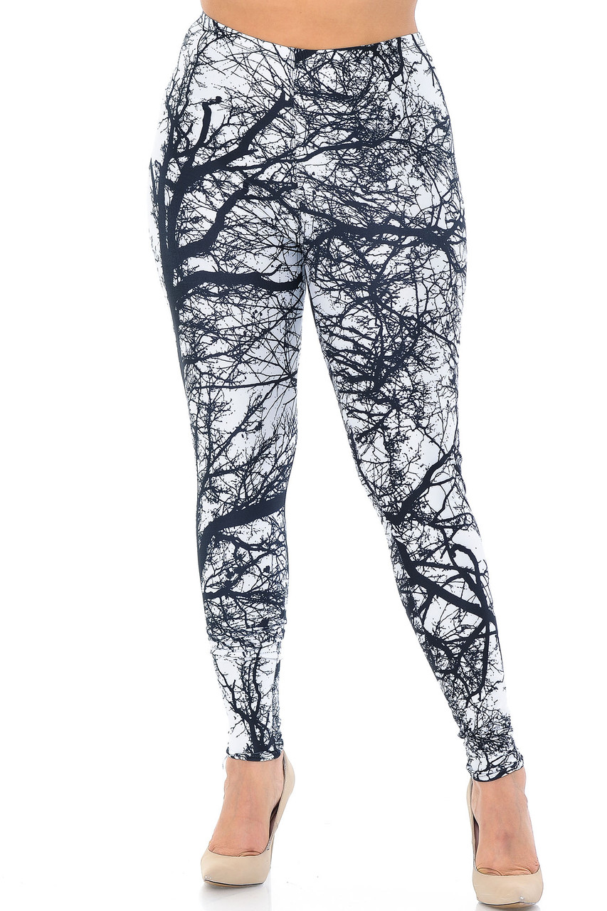 Front view image of our Creamy Soft Photo Negative Tree Plus Size Leggings - USA Fashion™ that offer a flattering skinny leg, body hugging fit, and a print that will bring any outfit to life.