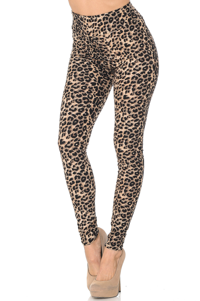 45 degree view of Buttery Smooth Feral Cheetah High Waisted Leggings with a classic spotted animal print design.