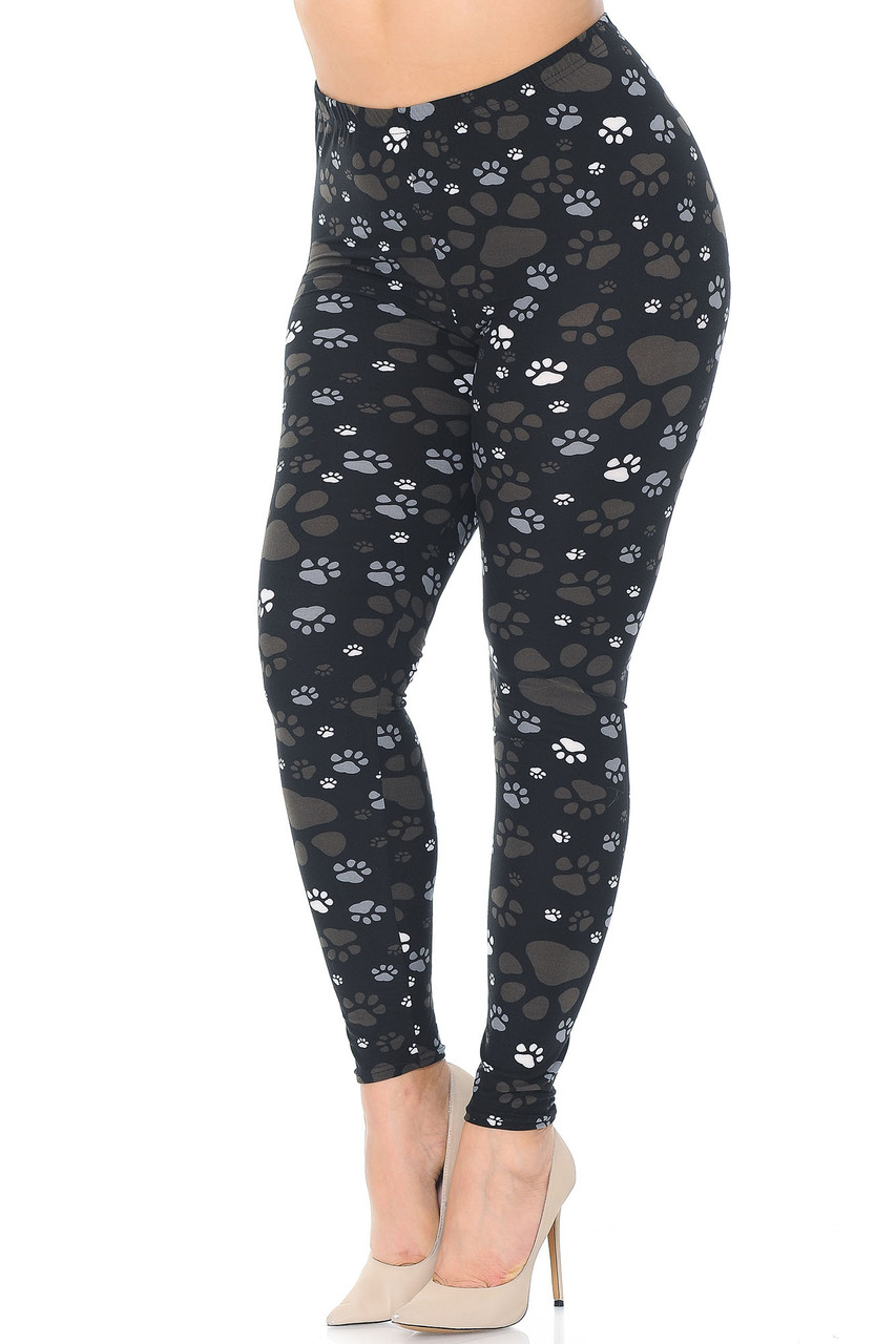 45 degree image of Creamy Soft Muddy Paw Print Extra Plus Size Leggings - 3X-5X - USA Fashion™ with an easy to style brown, gray, and white design.
