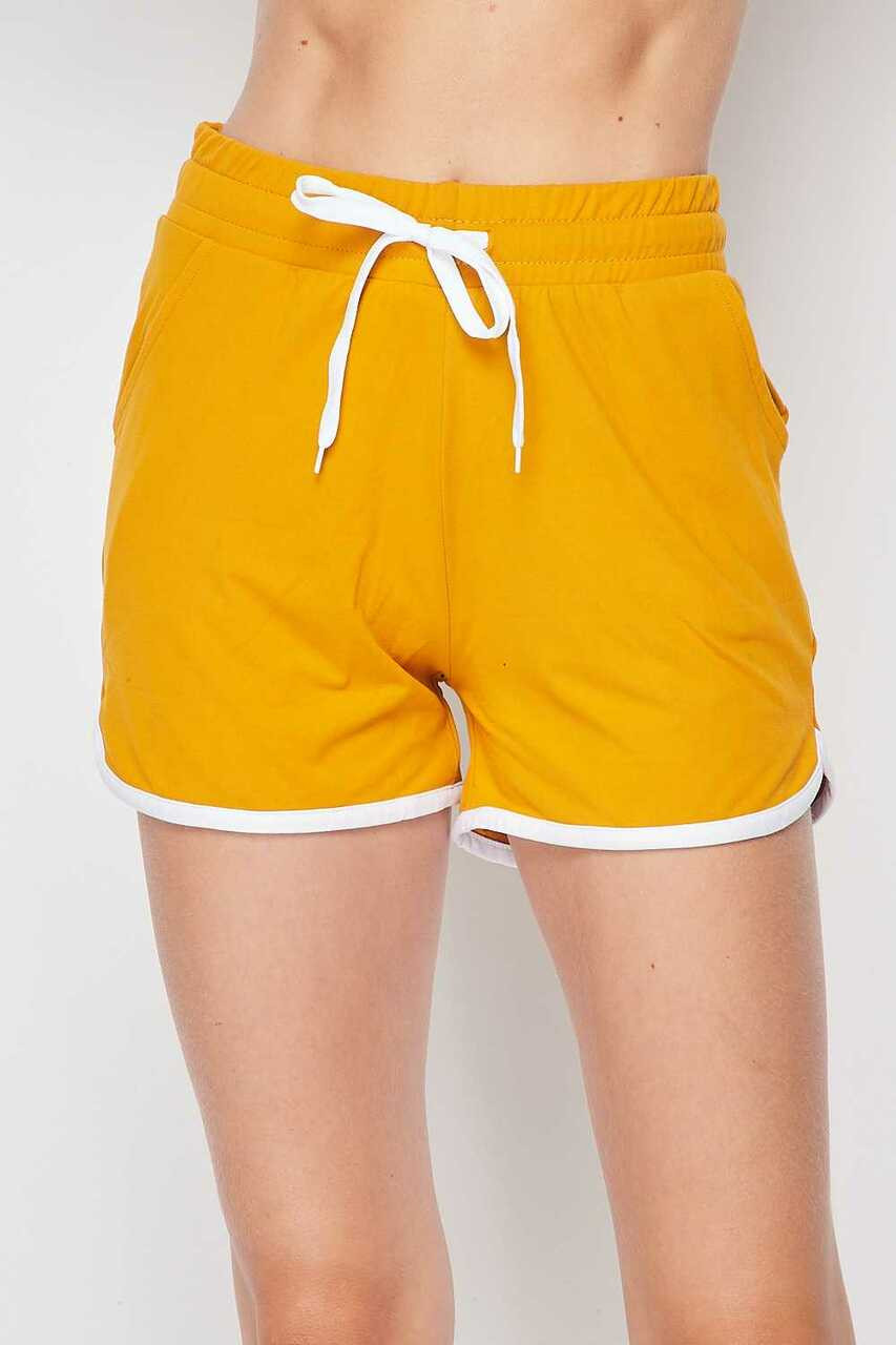Front side image of Mustard Buttery Smooth Drawstring Waist Plus Size Dolphin Shorts with Pockets