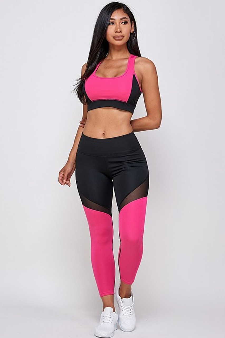 Front side image of Premium 2 Piece Fuchsia Color Block Bra Top and Leggings Sport Set with a cool two-toned black and fuchsia design and mesh accents.