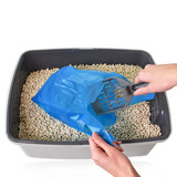Tie handle bag with litter box scoop