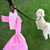 Tie handle dog poop  bags in duffel waste bag dispenser with used, tied bag clipped on the metal carabiner clip