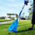 Blue tie handle dog waste bag on the Dog Bag It Pooper Scooper picking up dog waste on grass