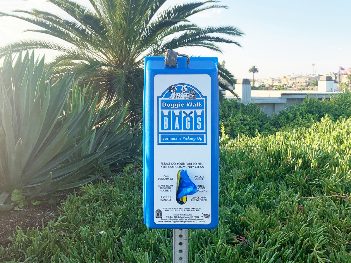 Classic dog waste bag dispenser in park