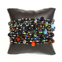 Black Multicolor Gleaming Crystals and Glass Beads Twelve Strands 3" Wide Bracelet