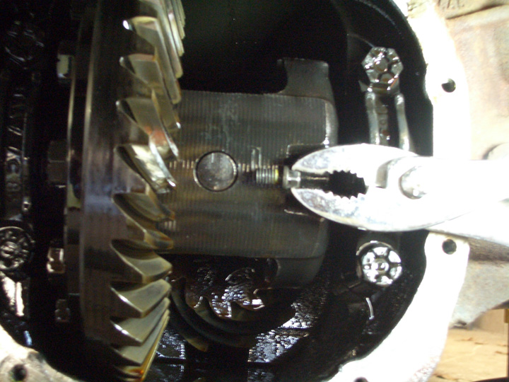 Q Can you extract the broken differential pinion shaft lock bolt