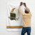 Long-lasting wall flag custom illustrated with an old school football helmet in white, orange & black (vertical orientation)
