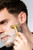 Man shaving with Natu Single Edge Safety Razor