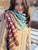 Pattern: Lamina Shawl by Ambah O'Brien in Rainbow Wall and Dusty Road (Iron Horse)