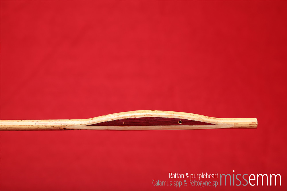 Handcrafted bdsm toys | Rattan spanking cane | By Sydney fetish artisan Miss Emm | The shaft is rattan and the handle is made from purpleheart with brass details. | Perfect for impact play, bdsm corporal punishment scenes, and all sorts of kinky fun in the hands of a Mistress, Master, Domina, Dom, Top, or anyone who enjoys caning.