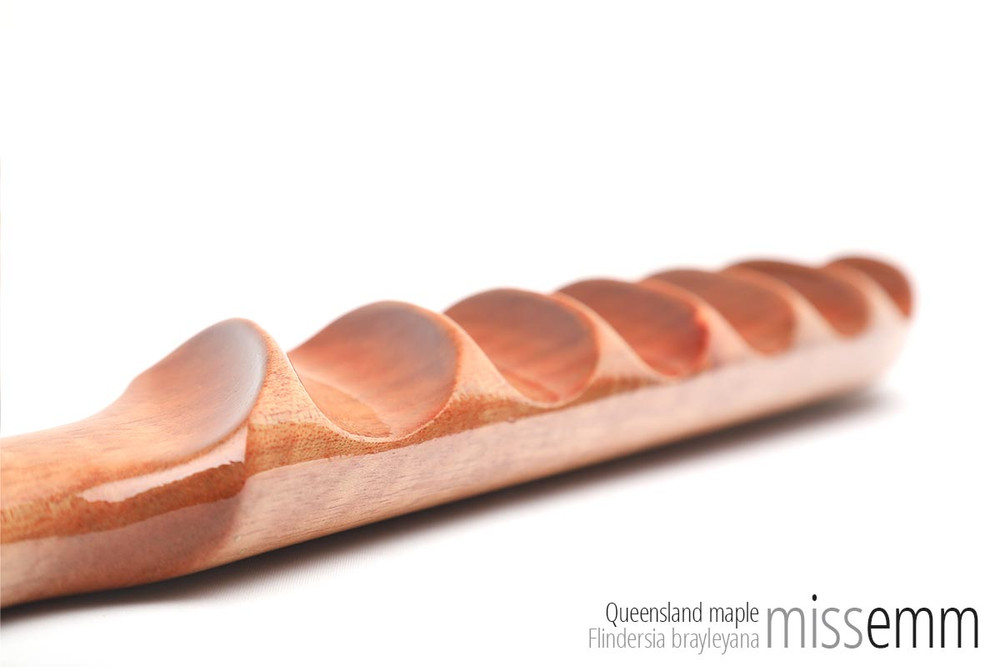 Handcrafted kink toys | Ridged wood spanking paddle | By fetish artisan Miss Emm | This stunning and unique spanking paddle is made from Queensland maple with brass details. It has a ridged and a domed face to provide two very different impact sensations.