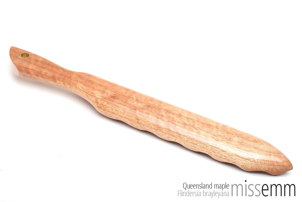 Handcrafted kink toys | Ridged wood spanking paddle | By fetish artisan Miss Emm | This stunning and unique spanking paddle is made from Queensland maple with brass details. It has a ridged and a domed face to provide two very different impact sensations.