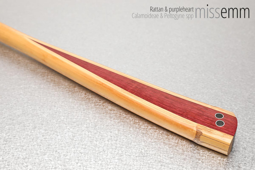 Unique handcrafted bdsm toys | Rattan spanking cane | By kink artisan Miss Emm | Made from rattan cane and purpleheart timber with aluminium details | For lovers of cane and thuddy impact toys. 