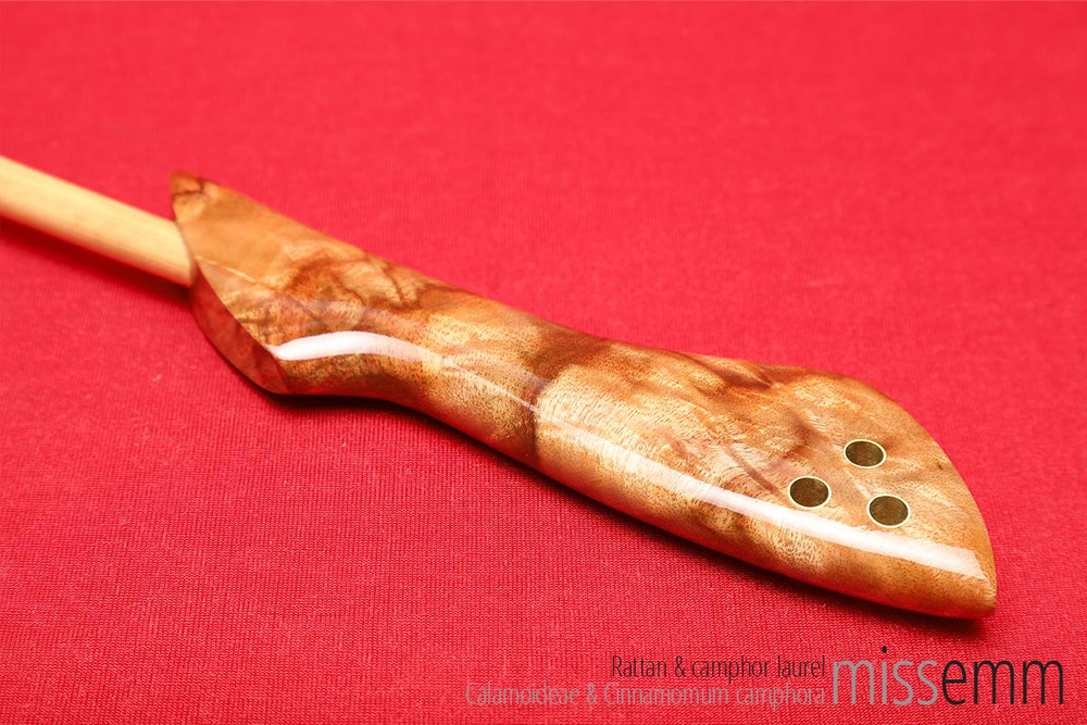 Unique handcrafted bdsm toys | Rattan spanking cane | By kink artisan Miss Emm | This stunning piece of kink art is made from rattan with a camphor laurel handle and brass details. It is the perfect fetish implement for those seeking to add something stylish, functional and unique, to their kink toy collection. 