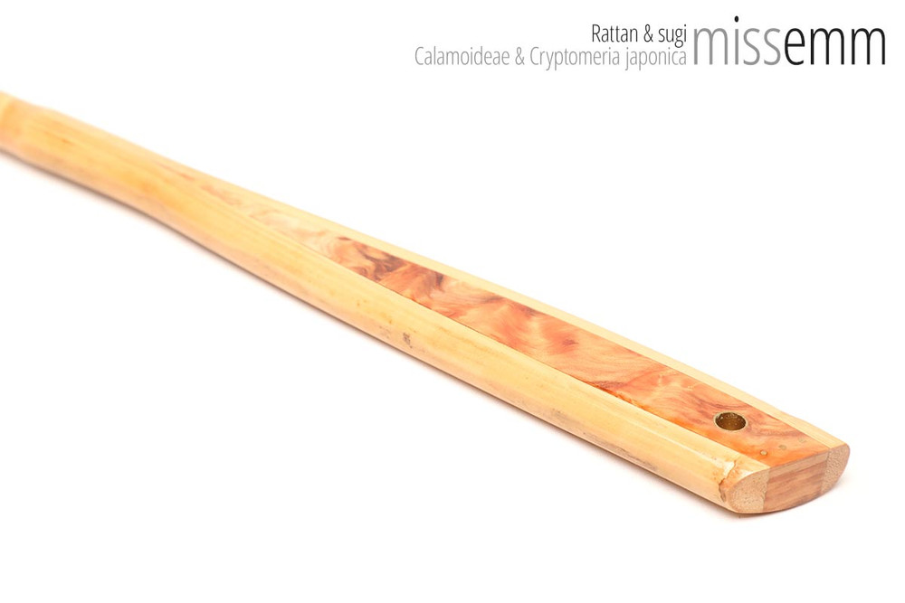 Unique handcrafted bdsm toys | Rattan spanking cane | By kink artisan Miss Emm | The shaft is rattan cane and the handle has been handcrafted from Japanese cedar with brass details.