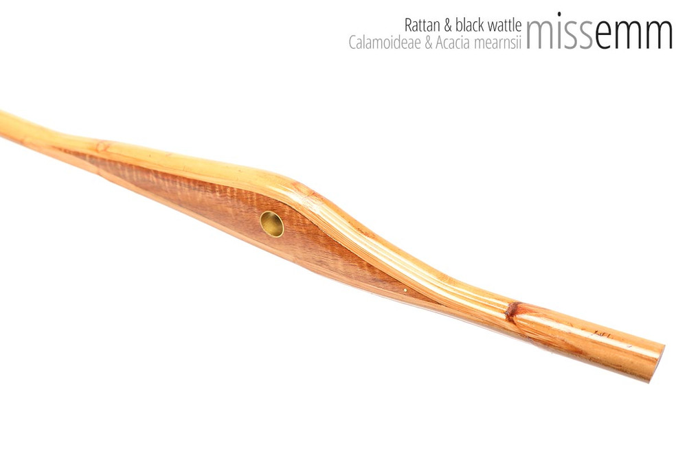 Unique handcrafted bdsm toys | Rattan spanking cane | By kink artisan Miss Emm | The shaft is rattan cane and the handle has been handcrafted from black wattle with brass details | 82cm long and 14mm in diameter.