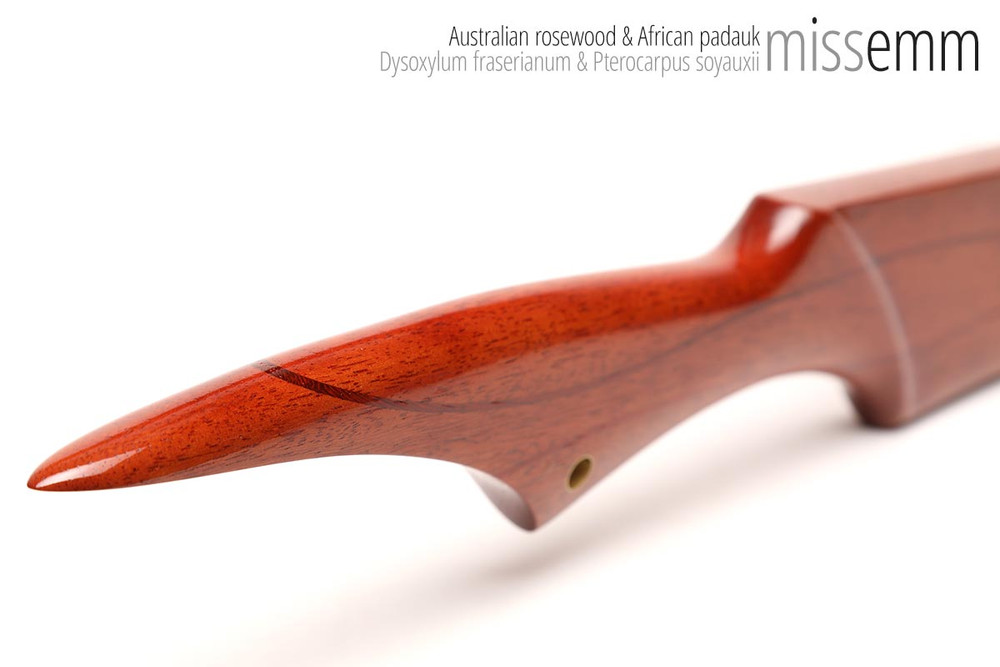 Unique handcrafted bdsm toys | Wooden spanking paddle | By kink artisan Miss Emm | Made from Australian rosewood with brass details | This paddle has a blade styled after a kitchen knife and a handle styled after who knows what!