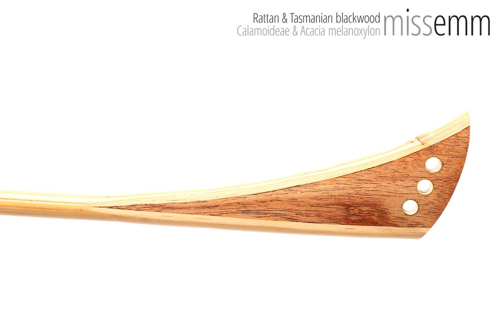 Unique handcrafted bdsm toys | Rattan spanking cane | By kink artisan Miss Emm | The shaft is rattan cane and the handle has been handcrafted from Tasmanian blackwood with brass details.