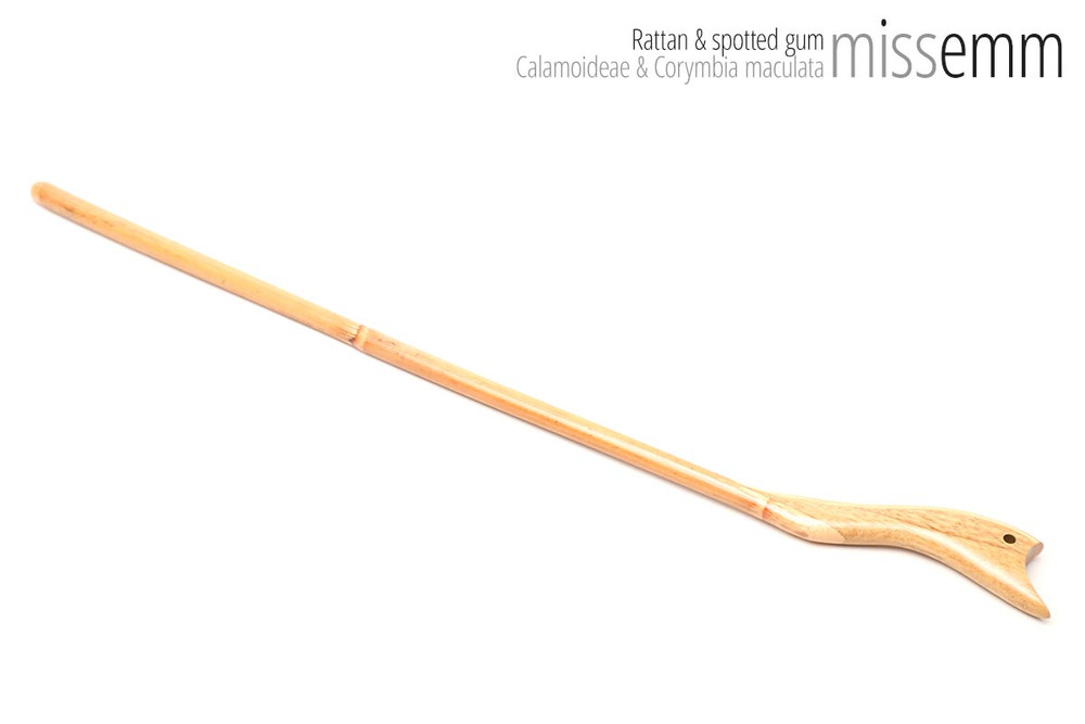 Unique handcrafted bdsm toys | Rattan spanking cane | By kink artisan Miss Emm | The shaft is rattan cane and the handle has been handcrafted from spotted gum with brass details.