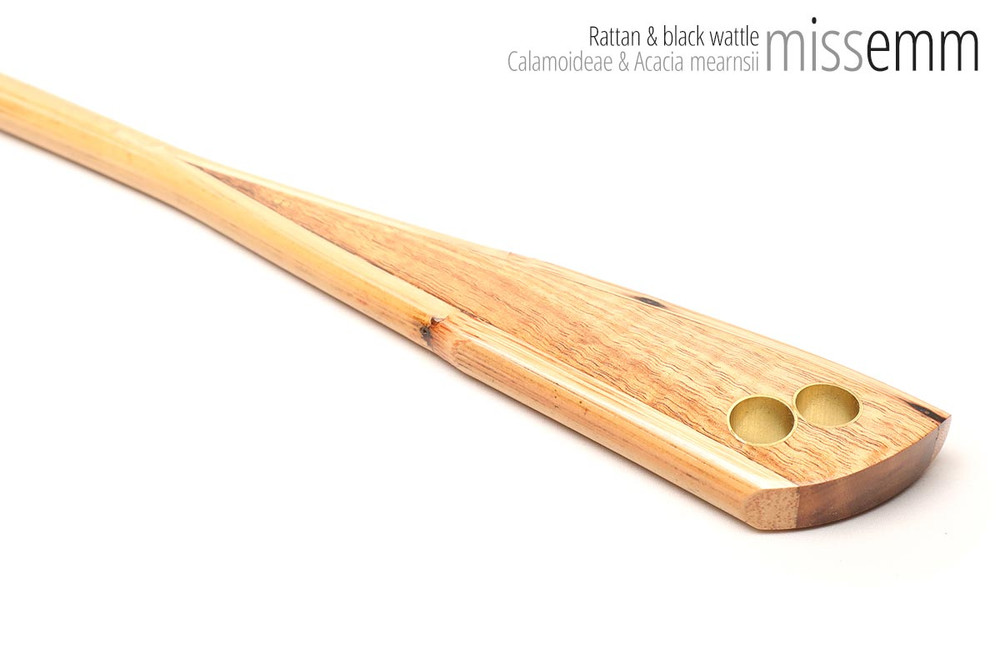 Unique handcrafted bdsm toys | Rattan spanking cane | By kink artisan Miss Emm | The shaft is rattan cane and the handle has been handcrafted from black wattle with brass details.