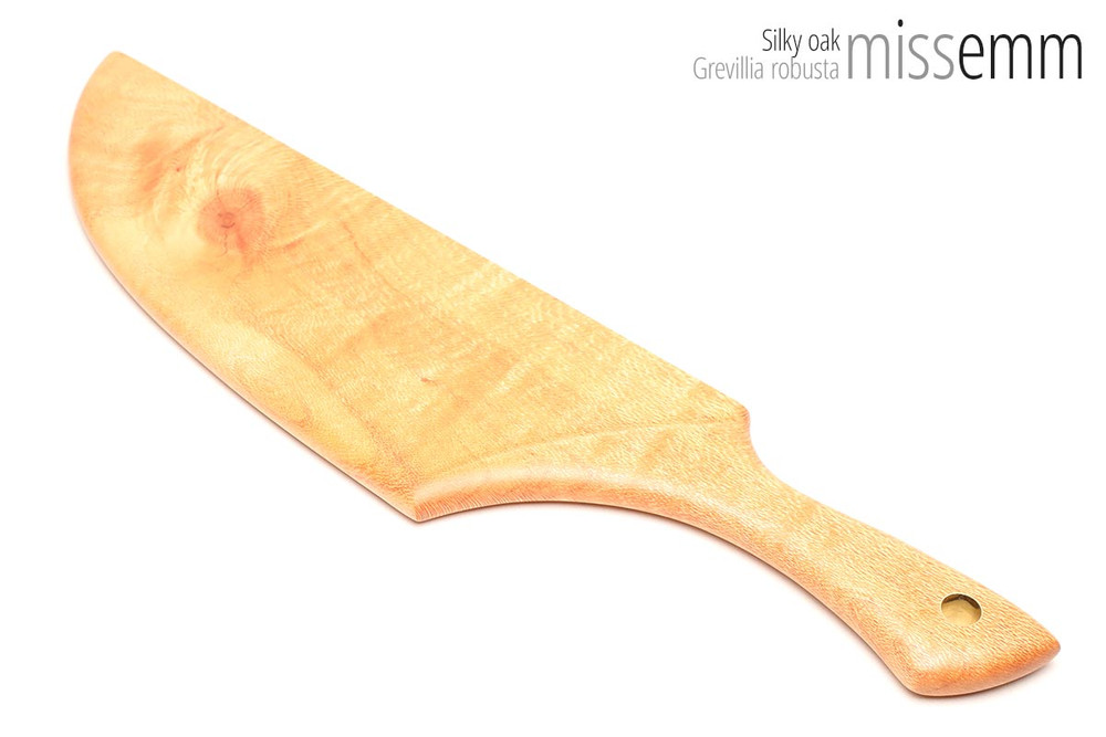 Unique handcrafted bdsm toys | Wooden spanking paddle | By kink artisan Miss Emm | Made from silky oak with brass details.