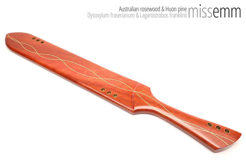 Unique handcrafted bdsm toys | Wooden spanking paddle | By kink artisan Miss Emm | Made from Australian rosewood with brass details.