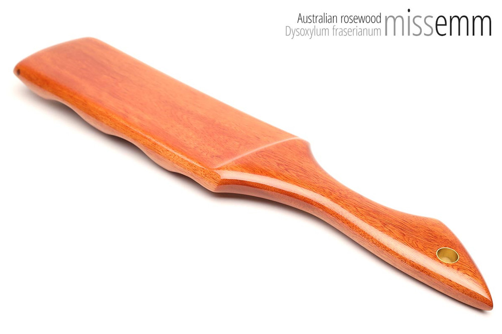 Unique handcrafted bdsm toys | Wooden spanking paddle | By kink artisan Miss Emm | Made from Australian rosewood with brass details.