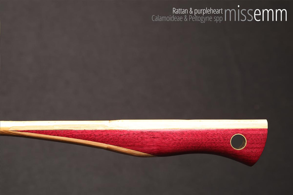 Unique handcrafted bdsm toys | Rattan spanking cane | By kink artisan Miss Emm | The shaft is rattan cane and the handle has been handcrafted from Purpleheart with brass details.