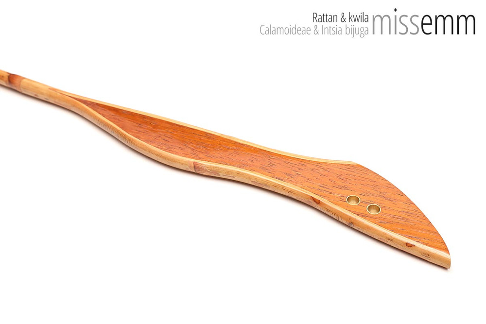 Unique handcrafted bdsm toys | Rattan spanking cane | By kink artisan Miss Emm | The shaft is rattan cane and the handle has been handcrafted from Kwila with brass details.