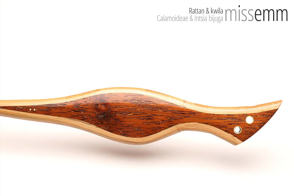 Unique handcrafted bdsm toys | Rattan spanking cane | By kink artisan Miss Emm | The shaft is rattan cane and the handle has been handcrafted from Kwila with brass details.