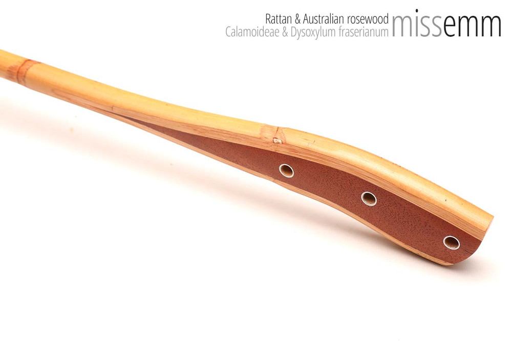 Unique handcrafted bdsm toys | Rattan spanking cane | By kink artisan Miss Emm | The shaft is rattan cane and the handle has been handcrafted from Australian rosewood with aluminium details.