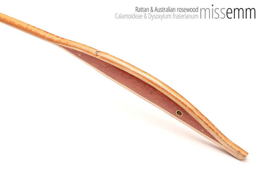 Unique handcrafted bdsm toys | Rattan spanking cane | By kink artisan Miss Emm | The shaft is rattan cane and the handle has been handcrafted from Australian rosewood with brass details.