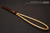 Unique bdsm spanking toys | Rattan loop cane | By kink artisan Miss Emm | The loop is made from rattan cane and the handle has been handcrafted from bamboo with brass details.