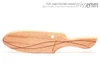 Unique handcrafted spanking toys | Wooden paddle | By kink artisan Miss Emm | Made from Queensland maple with brass details.