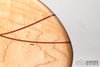 Detail from the tip of this Rock Maple paddle with Jarrah lines.