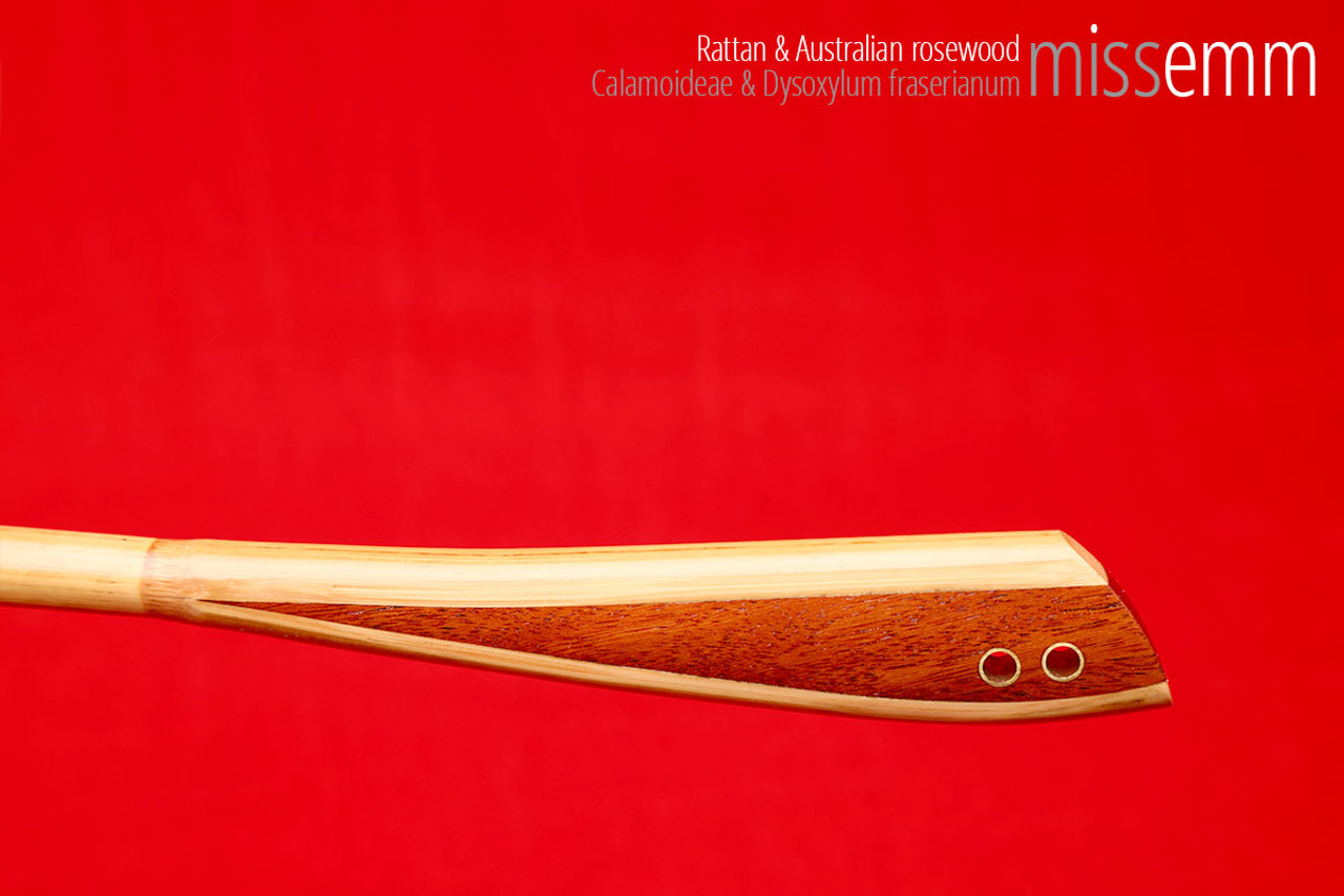 Handmade bdsm toys | Rattan cane | By kink artisan Miss Emm | The cane shaft is rattan cane and the handle has been handcrafted from Australian rosewood with brass details.