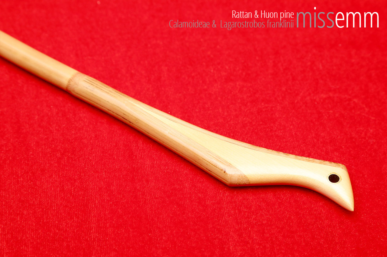 Handmade bdsm toys | Rattan cane | By kink artisan Miss Emm | The cane shaft is rattan cane and the handle has been handcrafted from Huon pine with brass details.