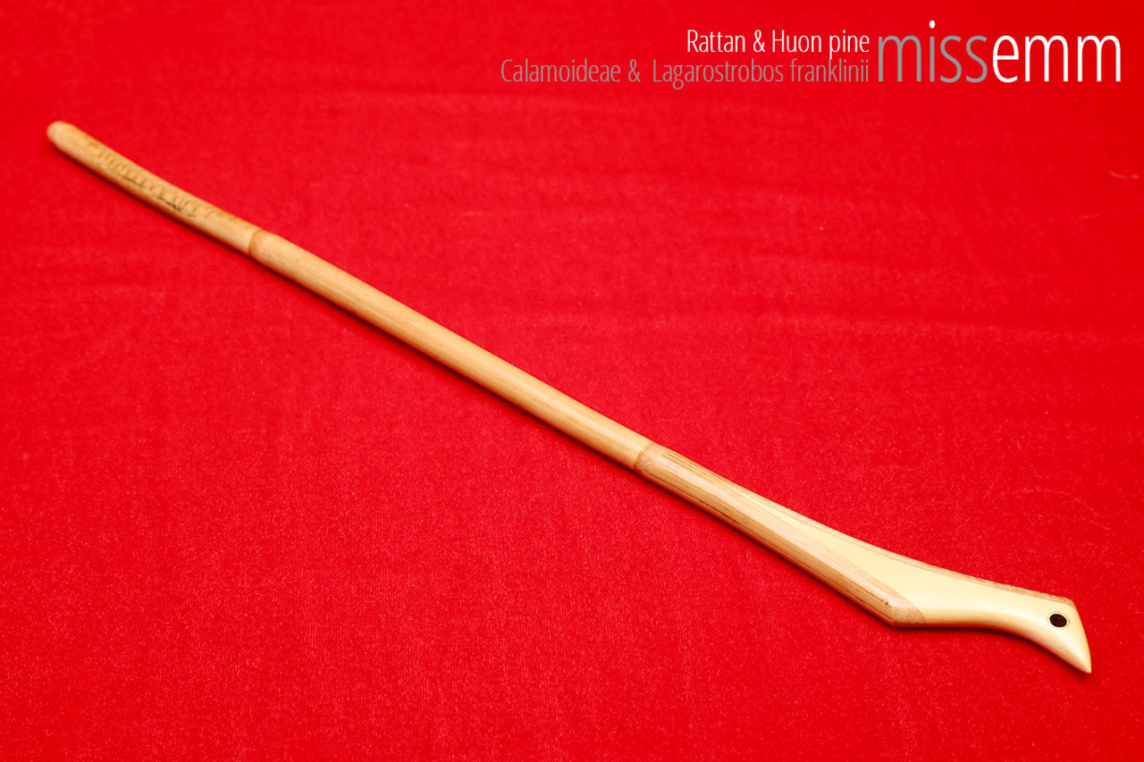 Handmade bdsm toys | Rattan cane | By kink artisan Miss Emm | The cane shaft is rattan cane and the handle has been handcrafted from Huon pine with brass details.