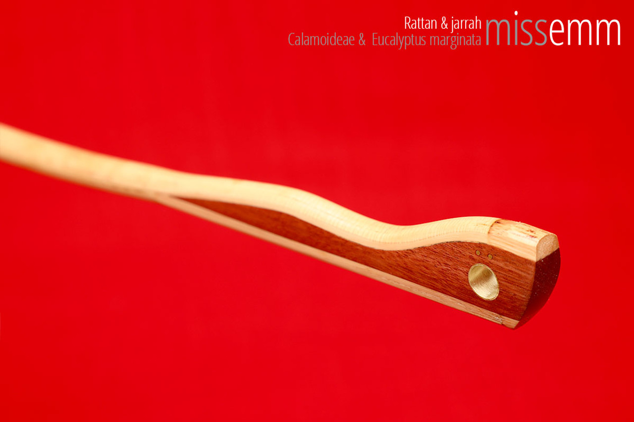 Handmade bdsm toys | Rattan cane | By kink artisan Miss Emm | The cane shaft is rattan cane and the handle has been handcrafted from jarrah with brass details.