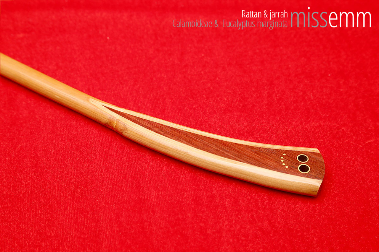 Handmade bdsm toys | Rattan cane | By kink artisan Miss Emm | The cane shaft is rattan cane and the handle has been handcrafted from jarrah with brass details.