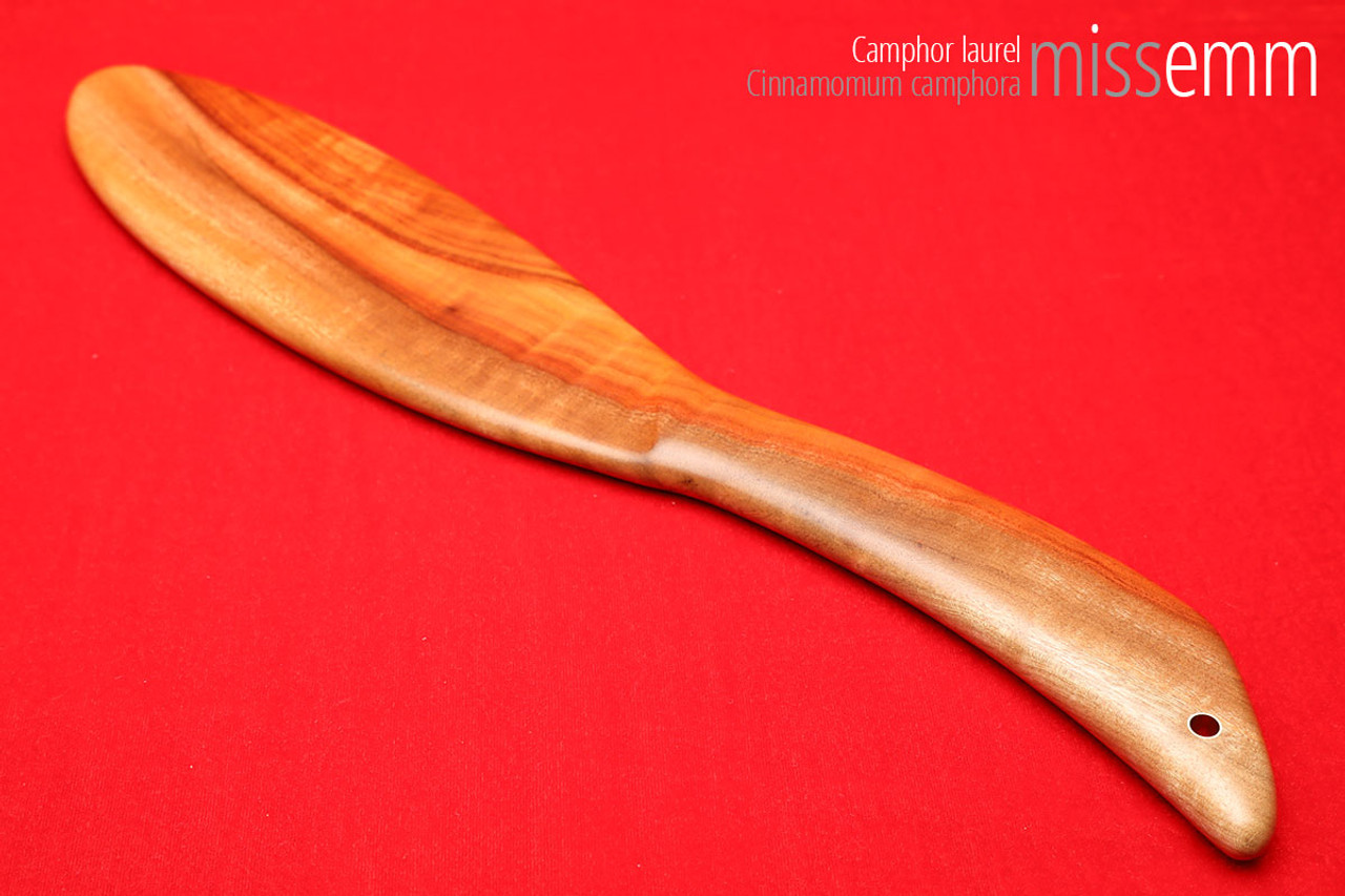 Unique handcrafted spanking toys | Wooden paddle | By kink artisan Miss Emm | Made from camphor laurel with brass details.