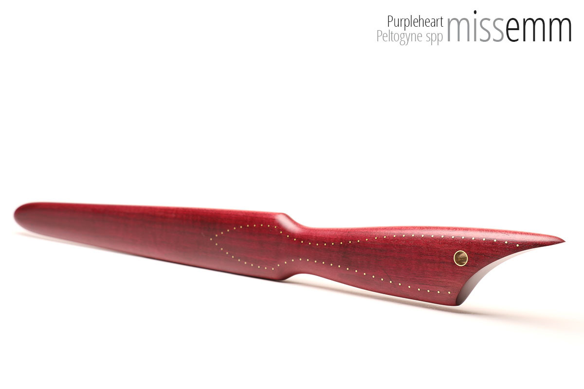 Unique handcrafted spanking toys | Wooden paddle | By kink artisan Miss Emm | Made from purpleheart with brass details.