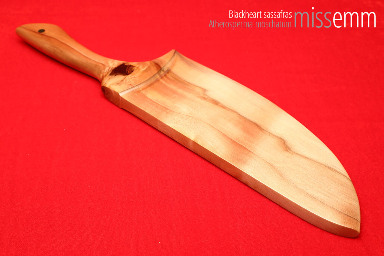 Unique handcrafted spanking toys | Wooden paddle | By kink artisan Miss Emm | Made from blackheart sassafras with brass details.