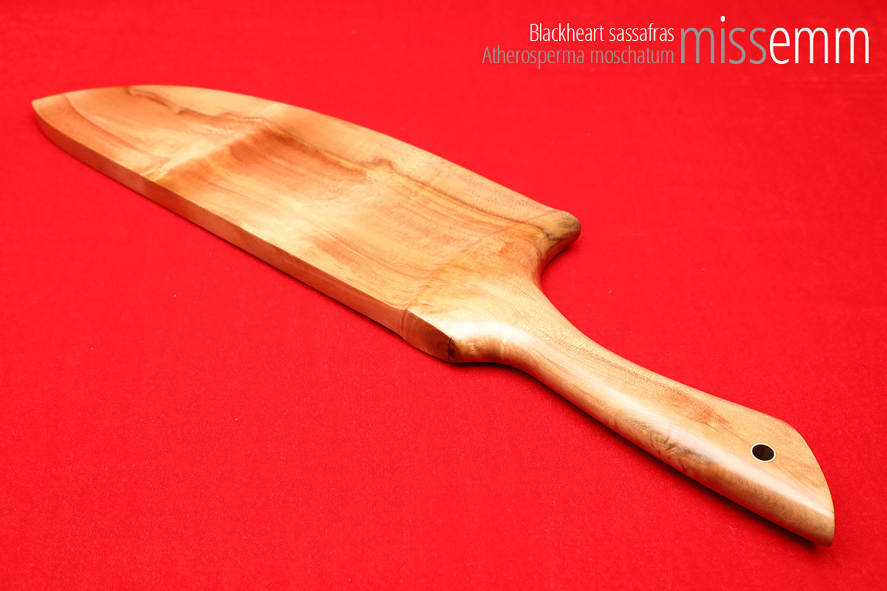 Unique handcrafted spanking toys | Wooden paddle | By kink artisan Miss Emm | Made from blackheart sassafras with brass details.