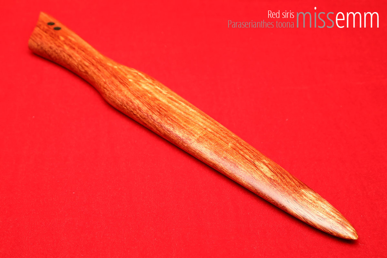 Unique handcrafted spanking toys | Wooden paddle | By kink artisan Miss Emm | Made from red siris with brass details.